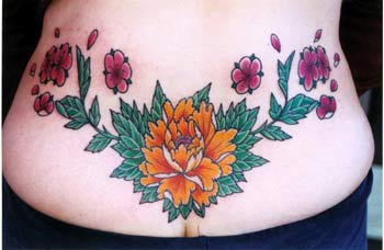 Colourful flowers tattoo on tail base