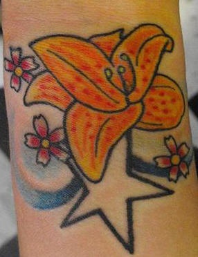 Colourful flowers and star tattoo