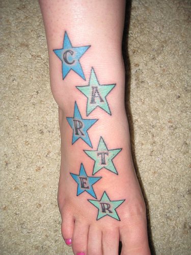 Carter- name in blue stars foot tattoo