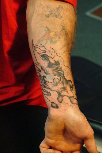 Black image like animal&quots claw forearm tattoo