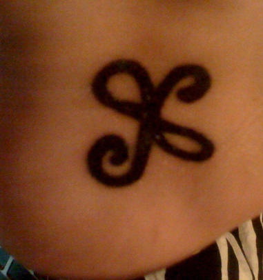 Friendship symbol tattoo in black