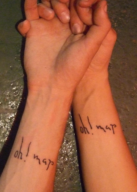 Identical wrist tattoos