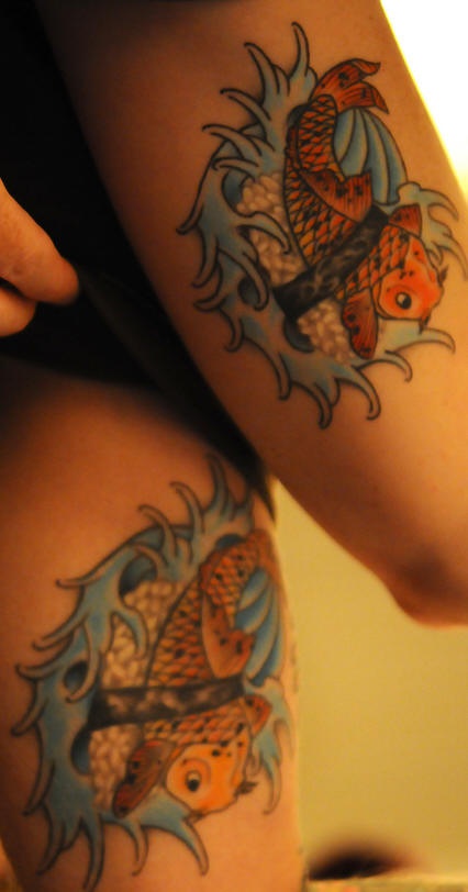 Identical koi with rice tattoos on friends