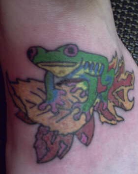 Frog on fallen leaves  tattoo