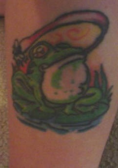 Croaking frog on swamp tattoo