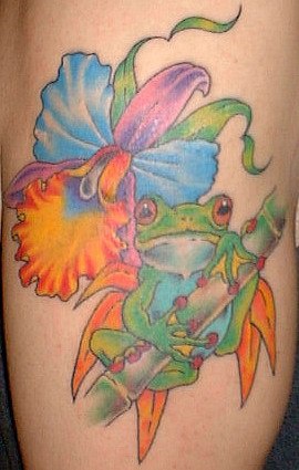 Frog on colourful exotic flower tattoo