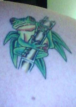 Frog on bamboo tattoo