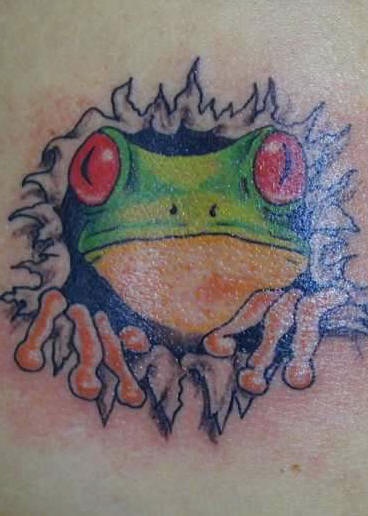 Frog face from under skin tattoo