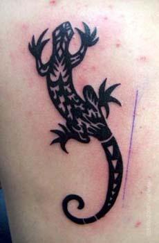 Black tribal lizard tattoo