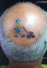Funny lawnmower tattoo on bald head