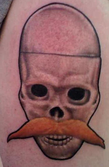 Creepy skull with mustache tattoo