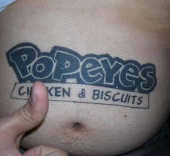 Advertisment tattoo on big stomach