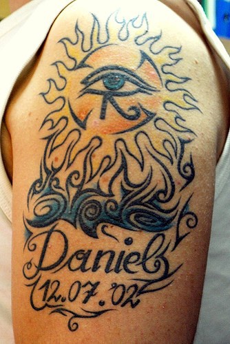 Occult symbols shoulder tattoo
