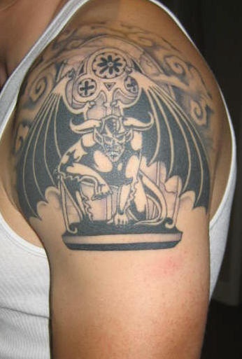 Gargoyle in church wingow tattoo