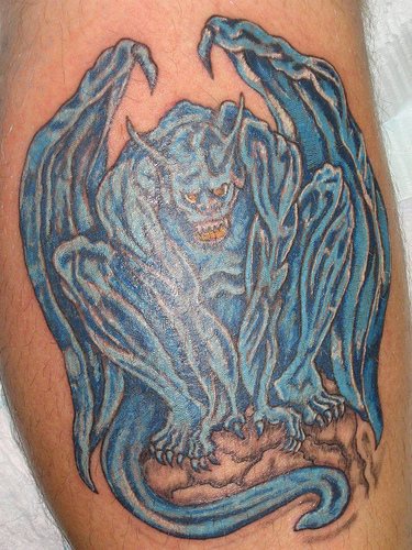 Angry blue Gargoyle tattoo