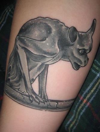 Gargoyle black ink tattoo