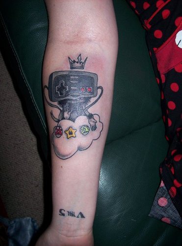 Nintendo joystick heaven tattoo on arm