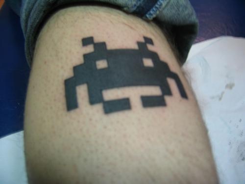 Eight bit space invaders black ink tattoo