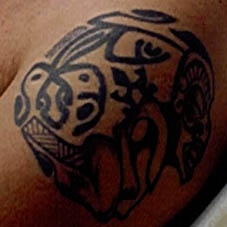 Black ink tribal tracery  tattoo