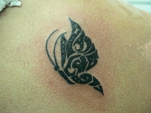 Le tatouage d&quotun papillon tribal