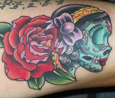 Sugar skull and rose tattoo