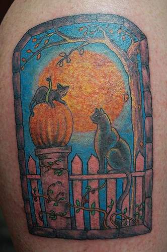 Black cats on halloween night tattoo