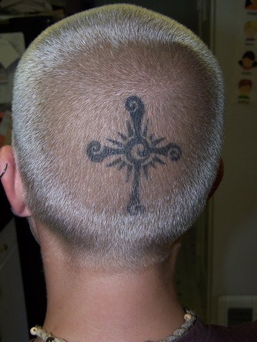 Head tattoo, designed, black curled cross