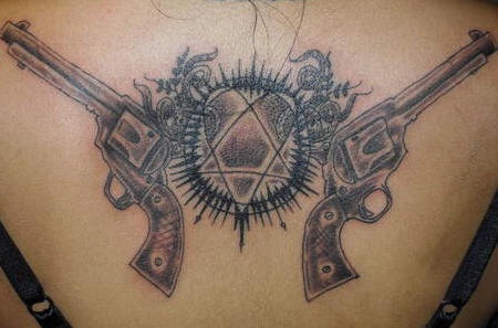 Heartigram with guns tattoo