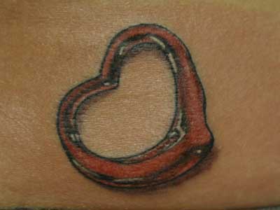 Red melting heart tattoo