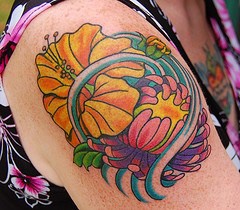 Colourful asian hibiscus in sea tattoo