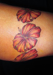 Colorful hibiscus armband tattoo