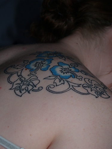 Blue hibiscus flower tracery tattoo