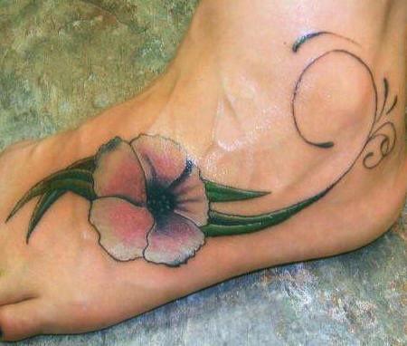 White and pink hibiscus flower tattoo on foot
