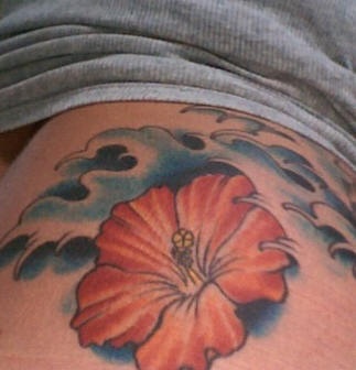 Hibiscus flower in sea tattoo