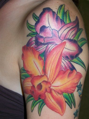 Orange and purple hibiscus tattoo