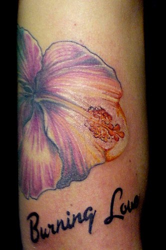 Pale purple hibiscus flower tattoo