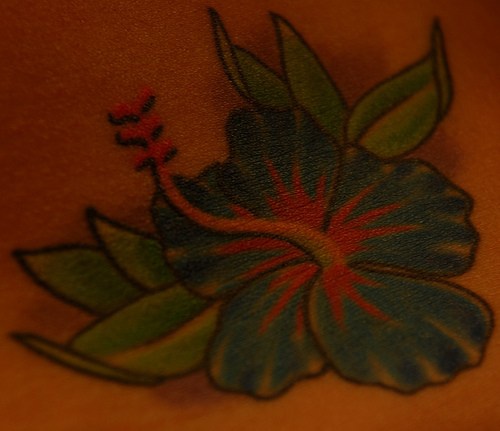Blue hibiscus flower tattoo
