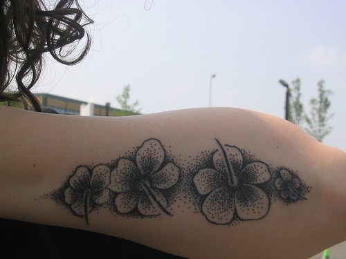 Hibiscus flowers black ink tattoo