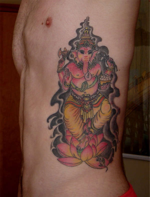 Pink ganesha on lotus tattoo