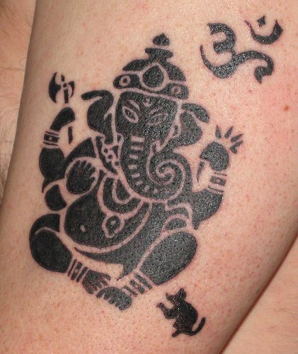 Ganesha deity black ink tattoo