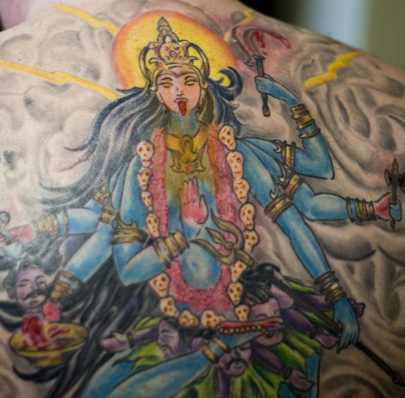 Angry hindu deity kali tattoo