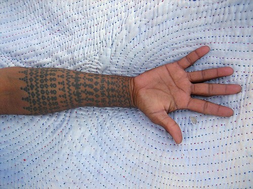 Hindu pattern sleeve tattoo