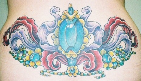 Picturesque, parti-coloured decorated gemstone hip tattoo