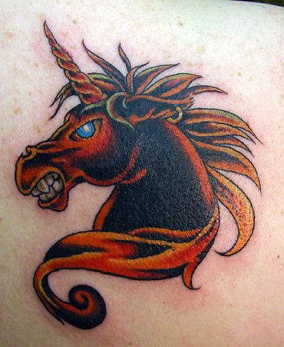 Evil red unicorn tattoo