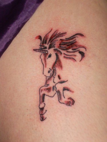 Running unicorn tattoo