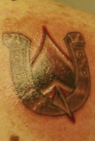 Horseshoe of spades tattoo