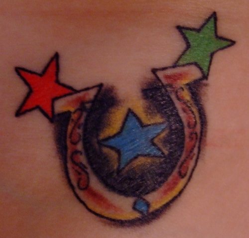 Horseshoe with three coloured stars