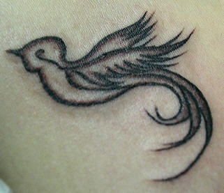 Minimalistic hummingbird tattoo