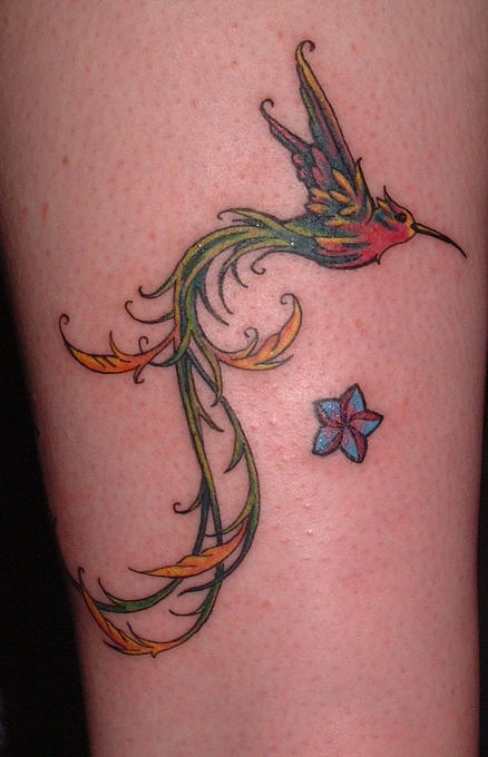 Majestic hummingbird with long tail tattoo