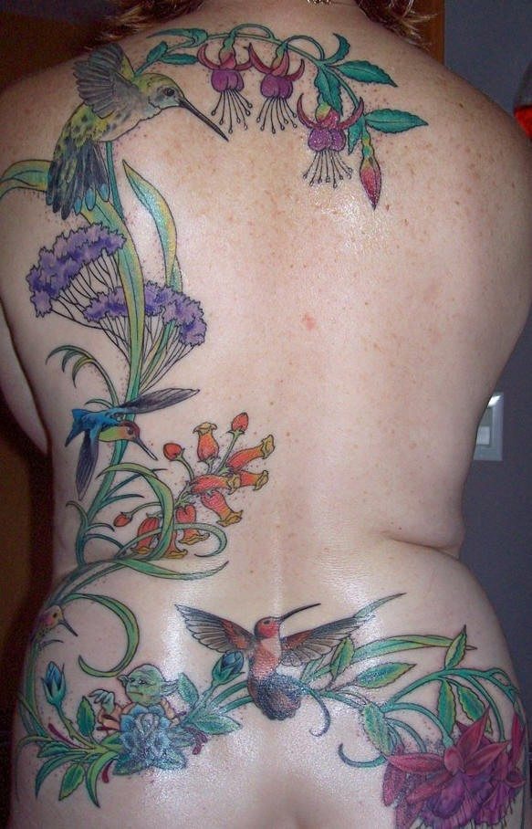 Flowers and hummingbirds full back tattoo